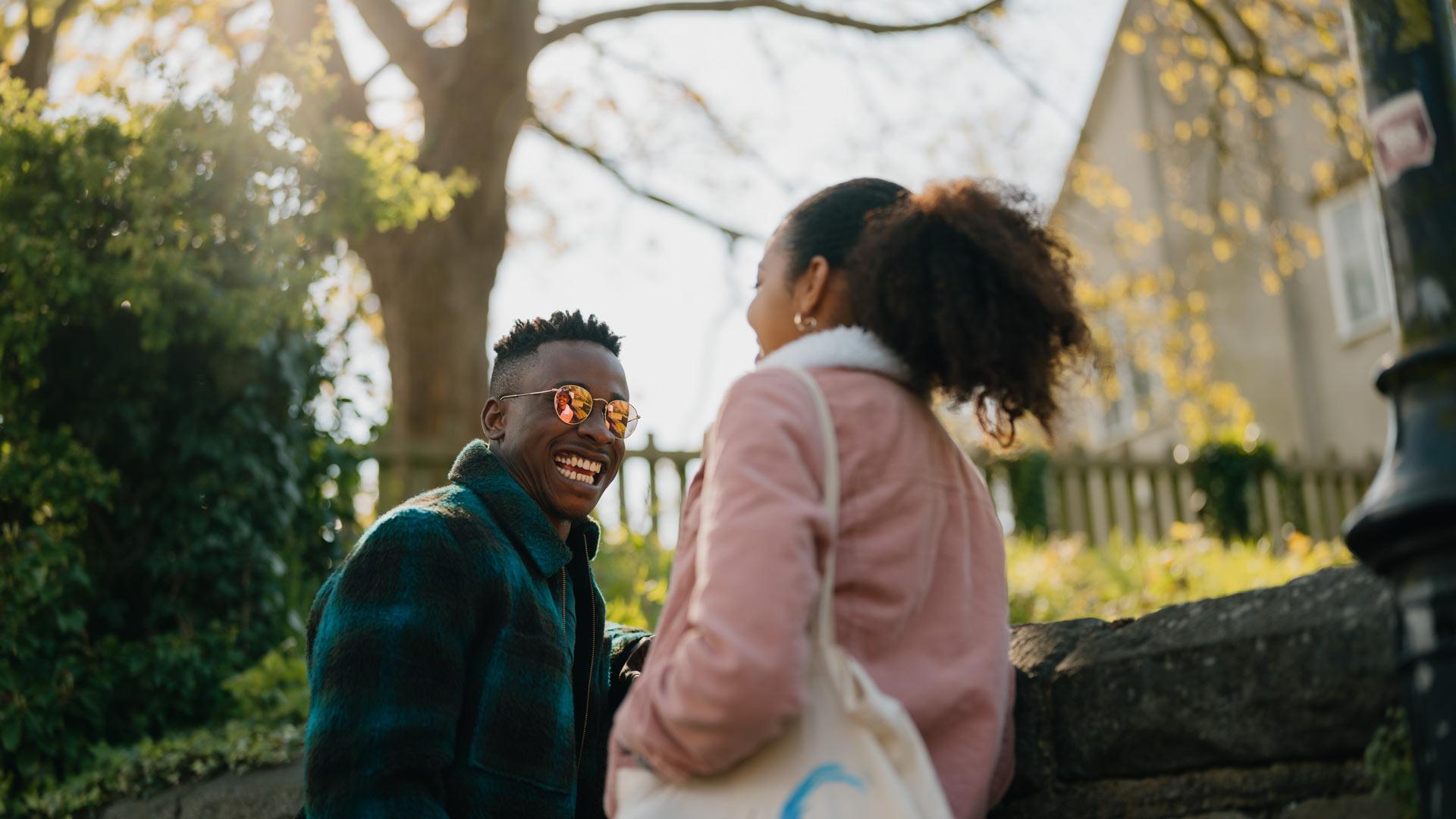 students chatting oustide university
