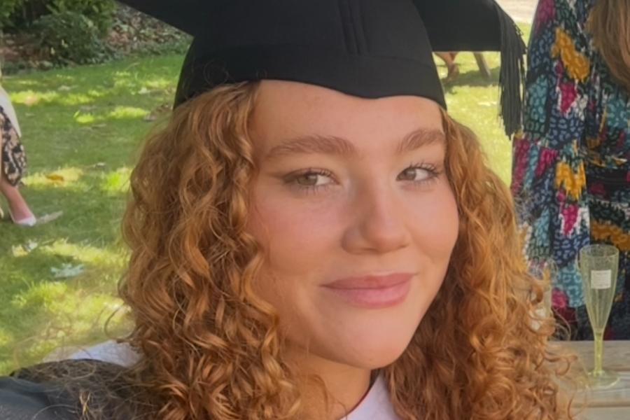 Student Siwan Iorwerth at graduation. Head and shoulder shot with graduation cap. 